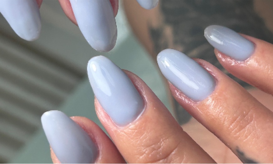 Image 8: One or Two 50 or 90-Min Gel Manicure & Pedicure Sessions for One