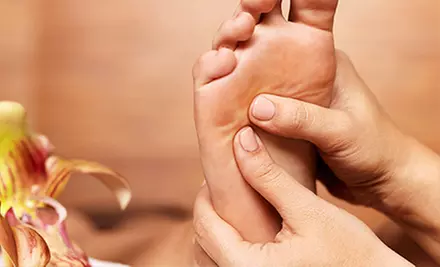 One or Two 60-Minute Therapeutic Massages with 15-Minute Sugar Foot Scrubs at Solé Spa Wellness Center (Up to 55% Off) - Primary Image