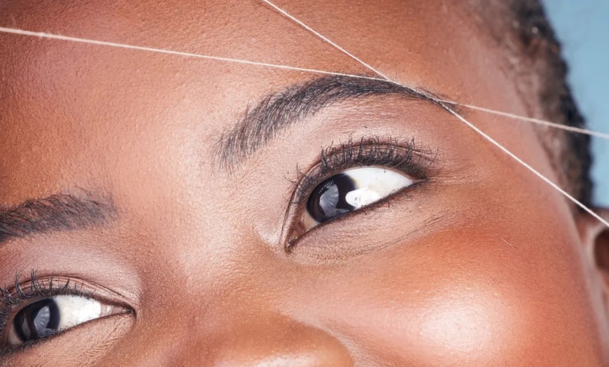Image 1: Up to 33% Off on Eyebrow Shaping at Bollywood Threading Salon & Spa