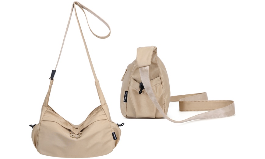 Image 16: Bandolera de estilo casual con correa ajustable y múltiples bolsillos
