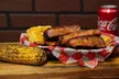 Treat Yourself to a BBQ Feast: Quarter Chicken, Family Meal or $50 Food & Drink Up to  31% Off At Big Belly Que - Second Medium