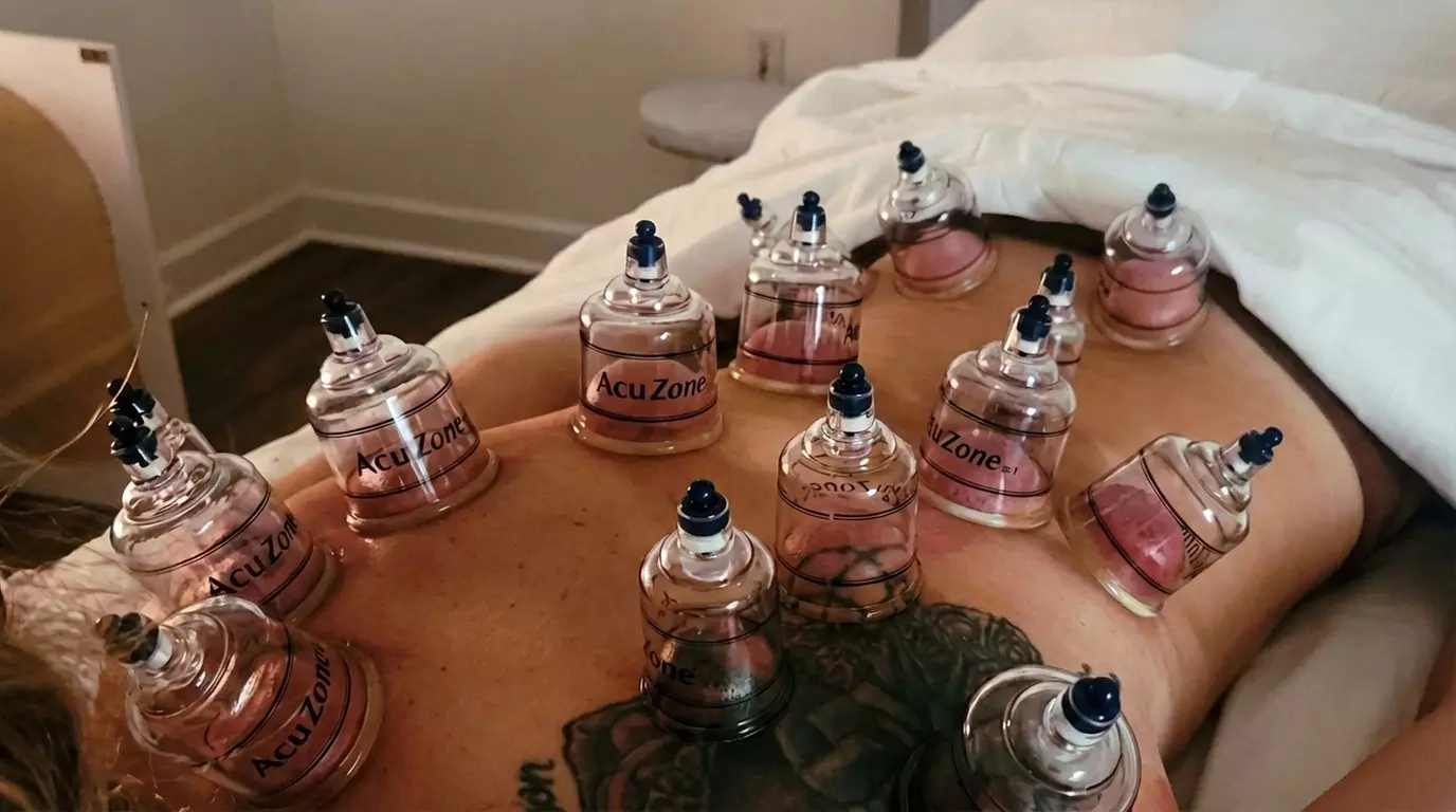 Rejuvenate with 60-Min Hot Stone, Lymphatic, or Cupping Massage