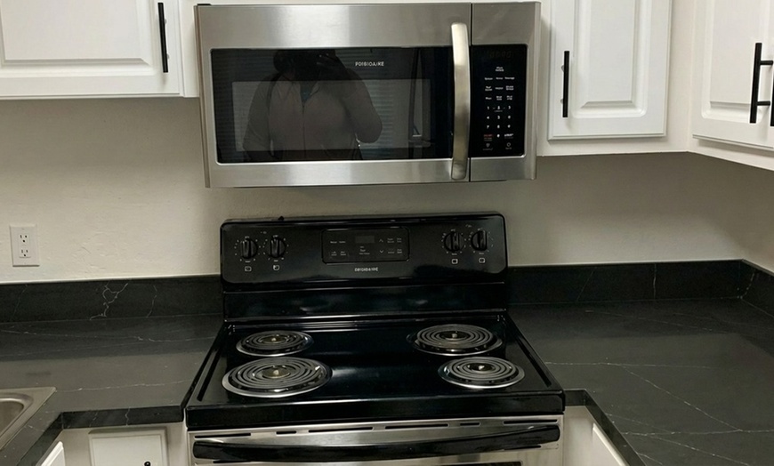 Image 5: Professional 2-Person House Cleaning with Flexible Hour Packages


