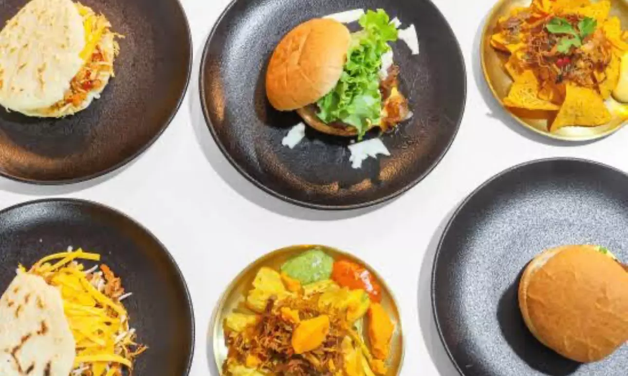 Buffet libre de entrantes y burgers para 2 personas con bebida