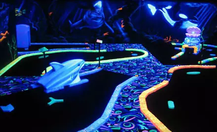 18 Holes of Glow-in-the-Dark Mini Golf for Four, Six, or Eight at U-Puttz Black Light Miniature Golf (Up to 58% Off) - Primary Image