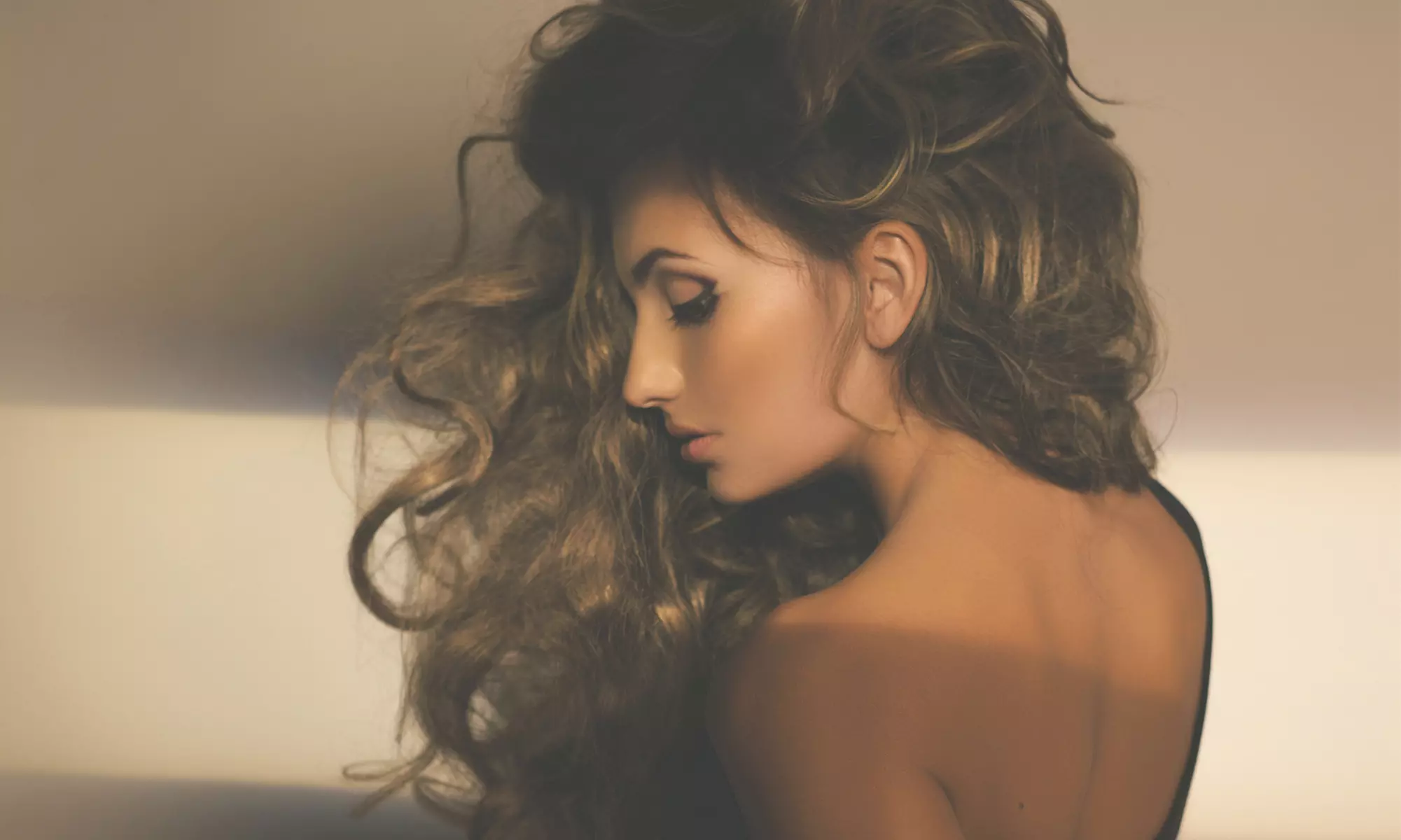 Cut Package with Condition, Color, or Partial or Full Highlights at Gisela's Beauty Center & Spa (Up to 52% Off) - Primary Image