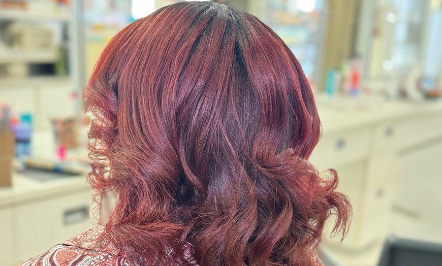 Image 9: Fresh Look Awaits: One Blowout or Silk Press at RoyalDollBeauty