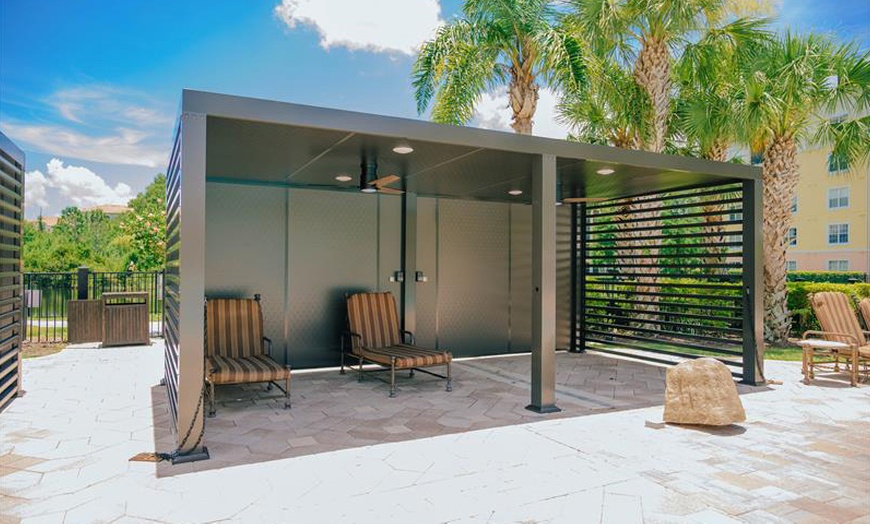 Image 21: Condo Resort With Mediterranean-Style Suites & Pool