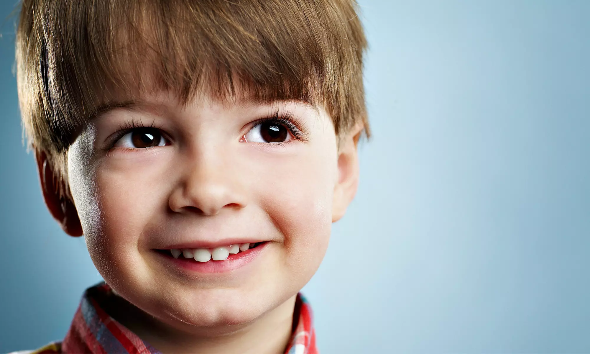 Kid's Haircuts and $10 Worth of Haircare Products or Toys at Shear Madness Haircuts for Kids (Up to 67% Off) - Primary Image