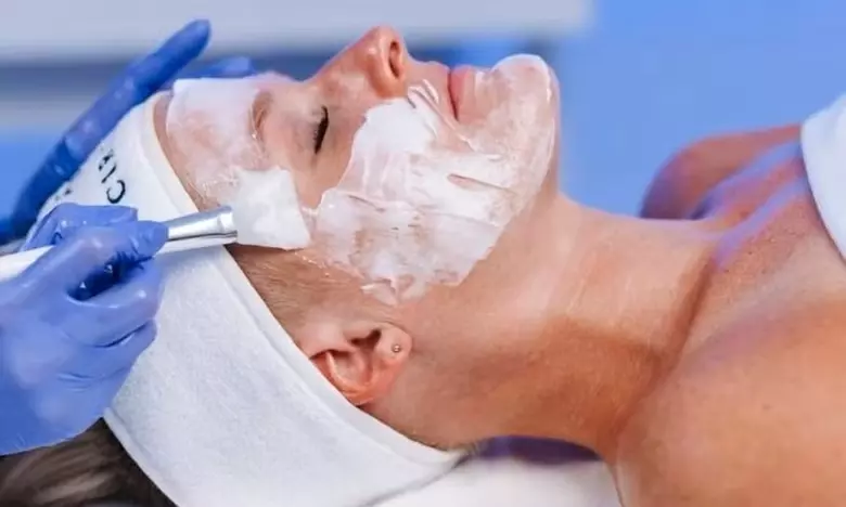 60-Minute Anti-Aging, Brightening, or Acne Facial with Decollete Scrub