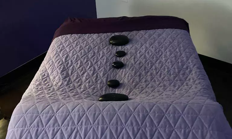 Unwind with a 60 or 90-min Swedish, Deep Tissue, or Hot Stone Massage!