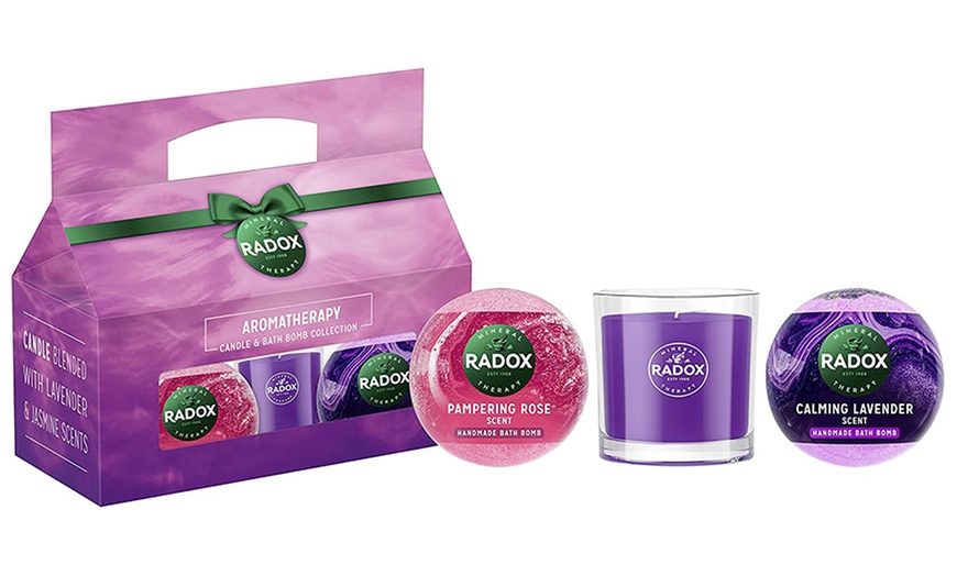 Image 1: Up to Four Three-Piece Radox Candle and Bath Bomb Gift Sets