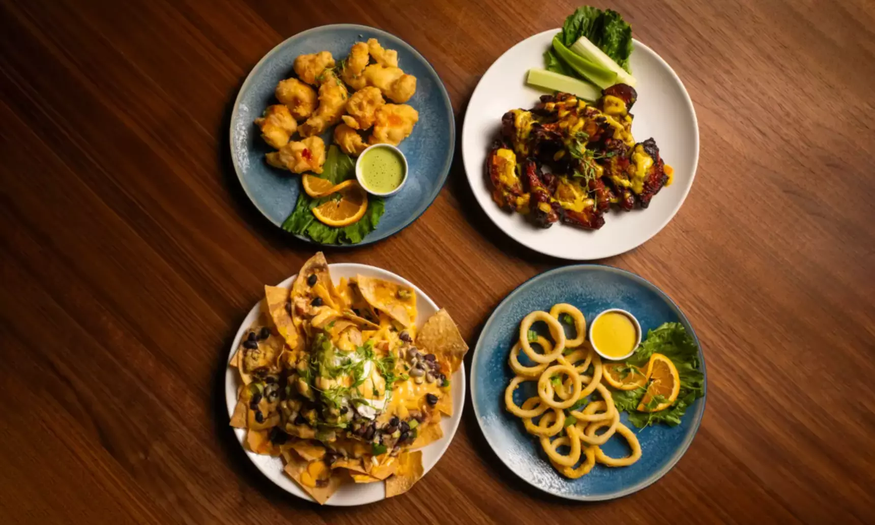 Savor a 2-Course Chef-Driven Dining Experience with Cocktails for Two or Four, or Dining Credit (Up to 60% Off)