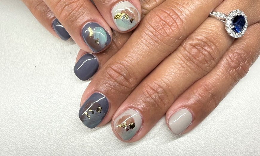 Image 7: Revitalize with a Basic Pedicure or Gel Polish Manicure