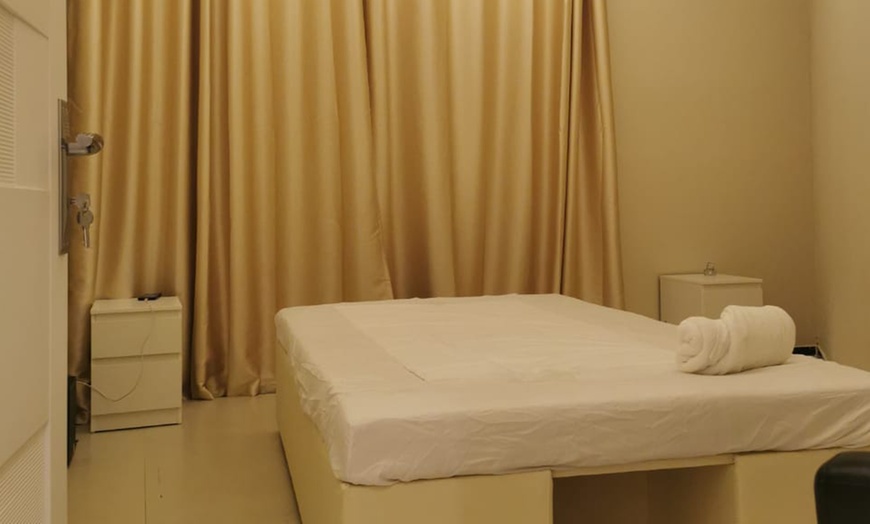 Image 1:  60 Min Moroccan Bath, 30 or 60 Min Head Spa, 40 Min Neck Spa & More