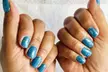Relax with a Basic or Gel Pedicure with 15-Minute Foot Massage OR Basic Manicure and Pedicure (Up to 33% Off) - Second Medium
