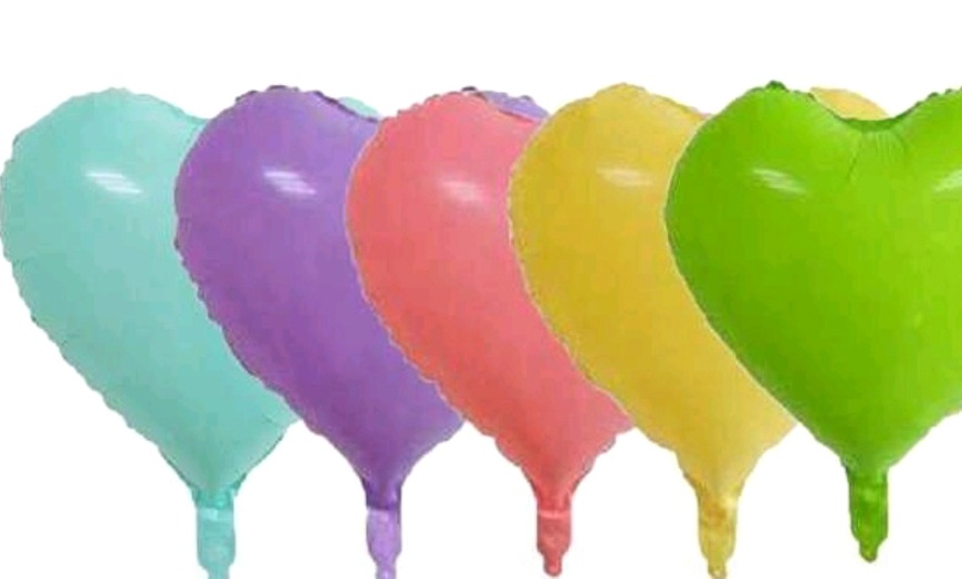 Image 6: An 18-inch Vibrant High Quality Long Floating Heart/Star Mylar Balloon