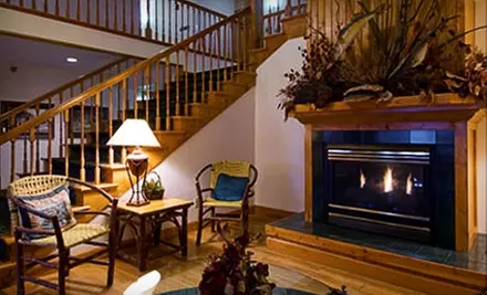$138 for One Night of Lodging and Golf for Two at Garrison Inn & Suites ($262.54 Value) - Primary Image