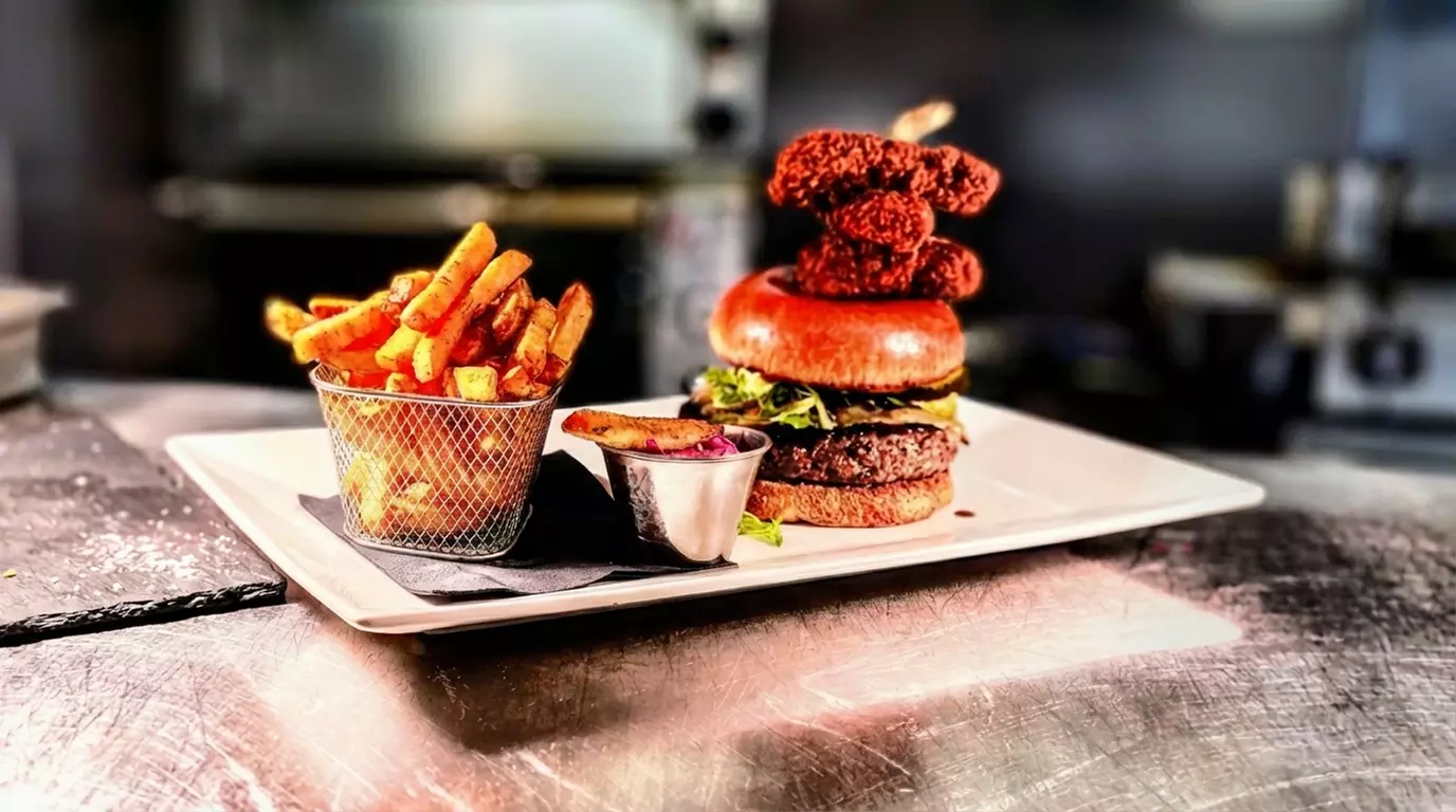 Choose From Any Burger On The Menu, Served with A Selected Drink