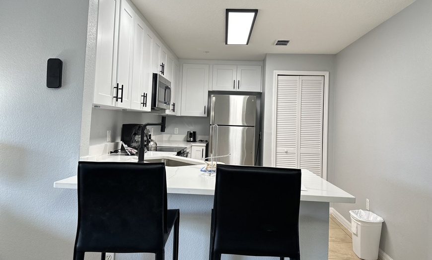 Image 15: Family Suites Hotel in Orlando near Theme Parks with Shuttle & Pool