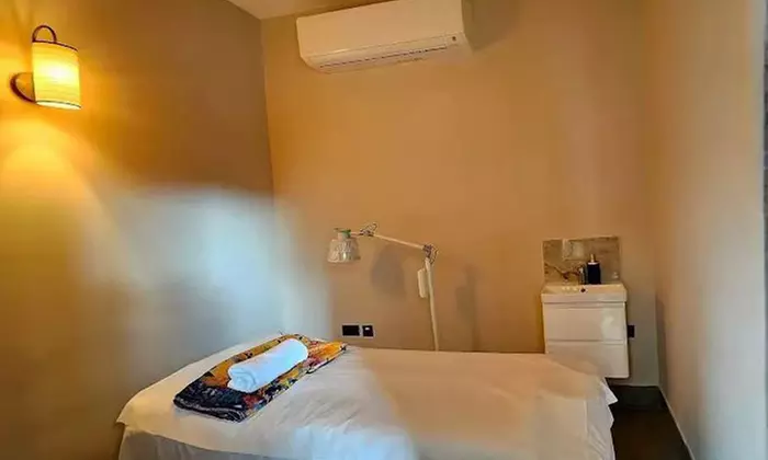 30 or 60-Minute Acupuncture or Choice of Massage with Optional Cupping