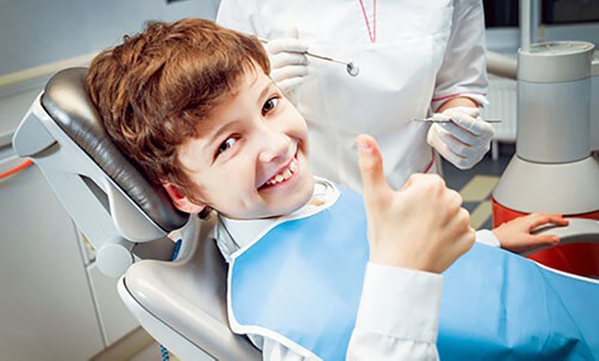 Image 2: Dental Check-Up & X-Rays w/ Optional Clean & Fluoride Treatment & More