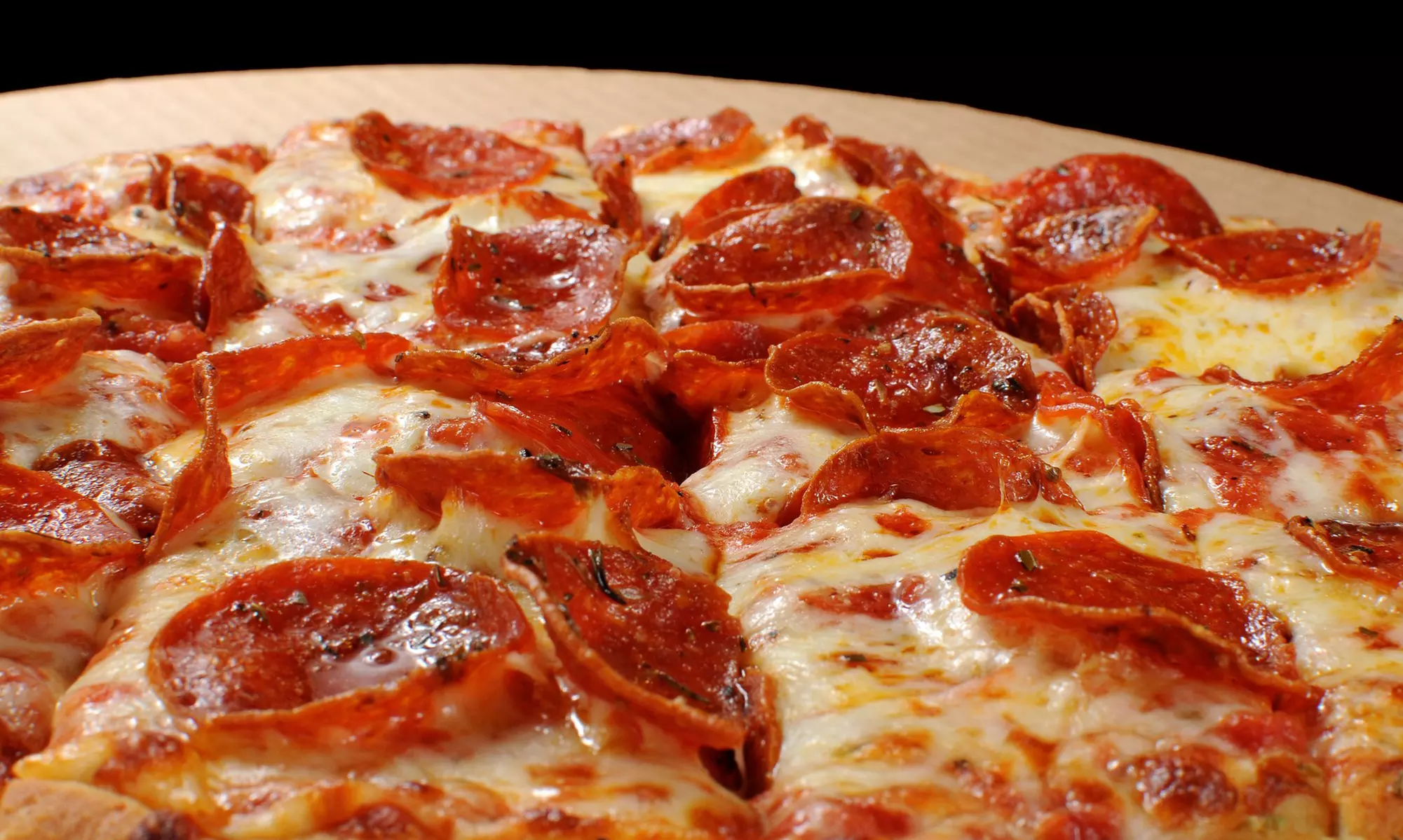 Two Large One-Topping Thin-Crust Pizzas at Nancy's Pizza (Up to 46% Off) - Primary Image