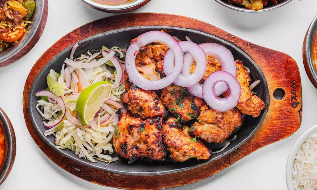 Authentic Indian Cuisine for Two, Four Person or Dining Credit