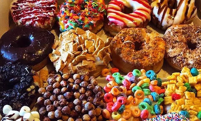 One Dozen Assorted Donuts at Glazed The Doughnut Cafe (Up to 42% Off) - Primary Image