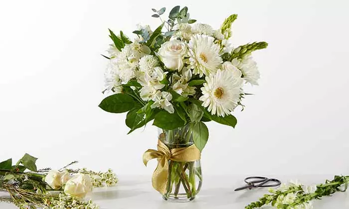 Spread Holiday Cheer! Same-Day Delivery on Stunning FTD Christmas Flowers & Gifts (Up to 55% Off)