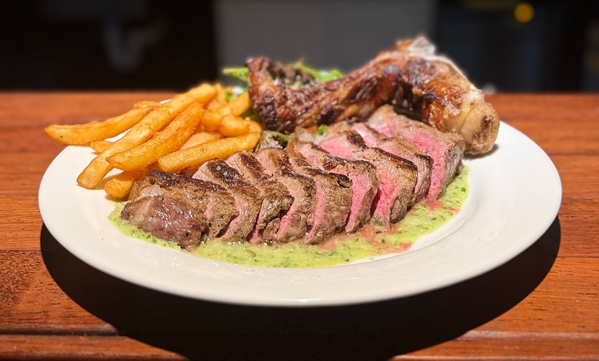 Image 1: 2-Course Gourmet Steak Dinner for Two w/ Wine or Beer at The Fourth Monkey Cocktail Bar and Grill (Get 45% Off)