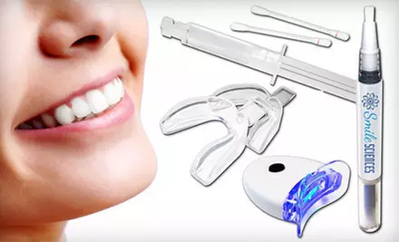 $29 for a Smile Sciences Teeth-Whitening Kit with LED Light and Whitening Pen ($299 List Price). Free Shipping. - Primary Image
