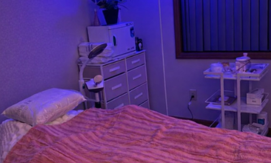 Image 3: 60-Minute Swedish Massage with Hot Towels and Mini or Full Facial
