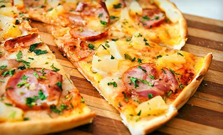 One Pizza with Salad, or Two Pizzas with Wings and Chicken Parmigiana Sandwich at Marc's Deli and Pizza (Up to Half Off) - Primary Image