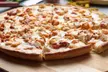 Grab $35,$45 or $55 Towards Food & Drink For Dine-In or Takeout at Pizza Twist (Up to 37% Off) - Second Medium