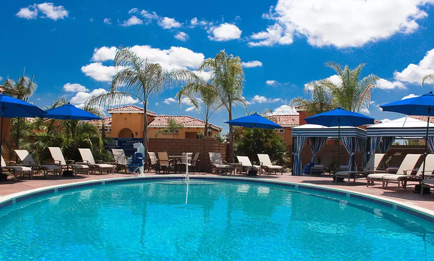 Outdoor pool with cabanas