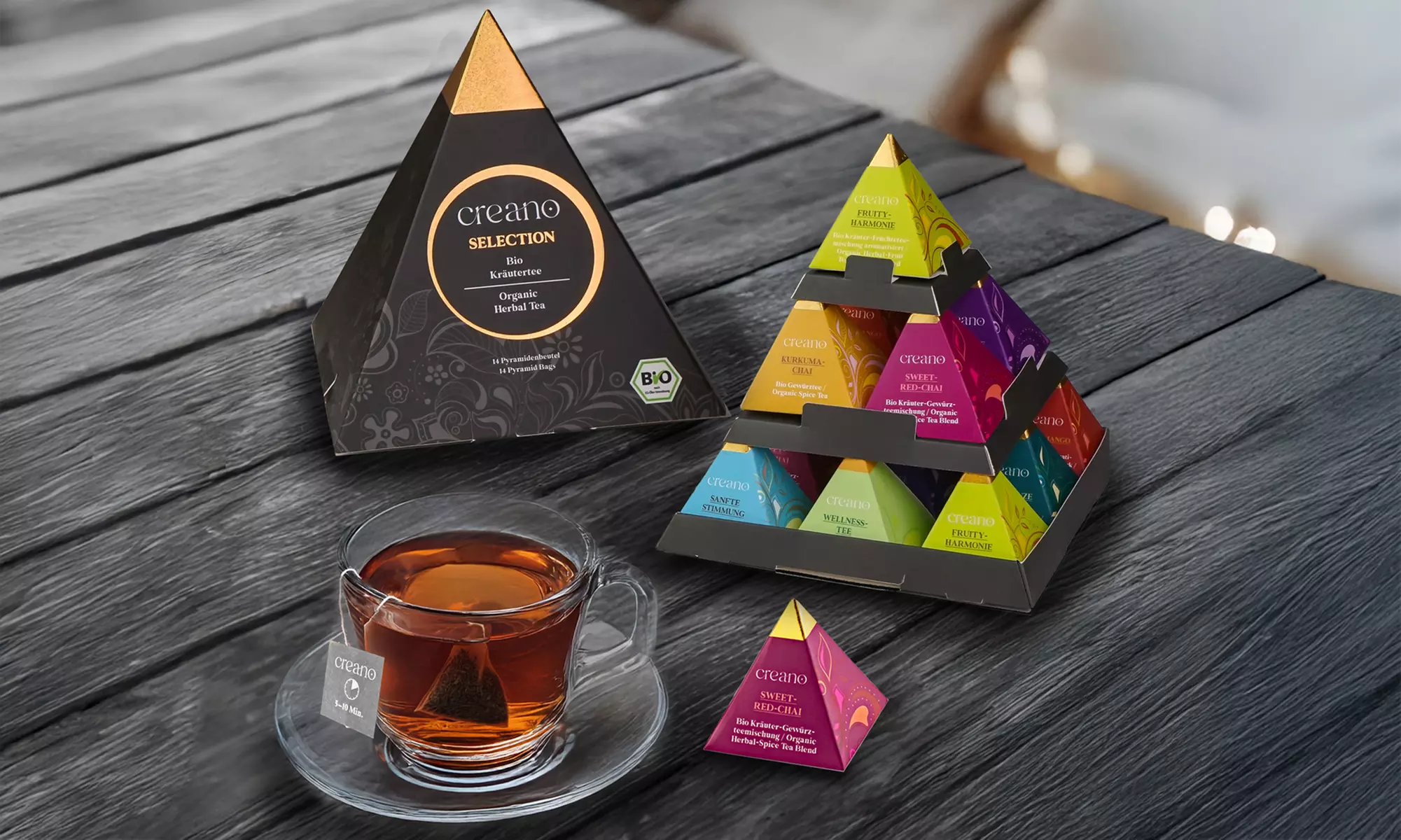 Creano Geschenk-Box „Pyramide“ mit 14 Pyramiden-Tees (bis 1,07 €/Stk.)