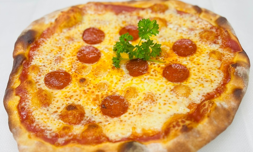 Image 10: Pizza or Pasta with Wine for 1–4 Guests at R & M Italiano