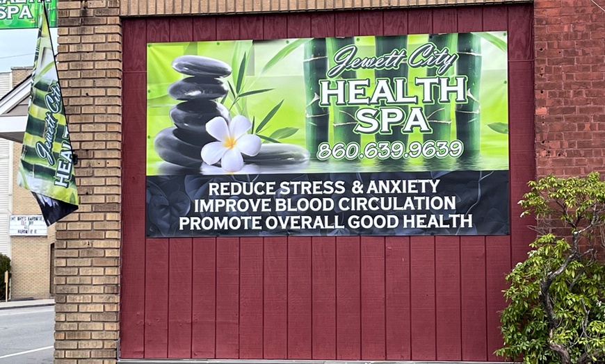 Image 11: Deluxe Full Body Massage with Choice of Hot Stone or Cupping Therapy