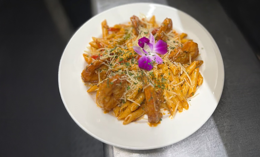 Image 4: Savor a Caribbean Spread for 2 or 4 - Starter, Main Dishes, & Drinks