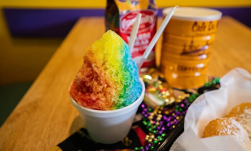 Image 14: Two Po'Boys, Meals for Two or Four With Beignets, and $50–$75 Credits