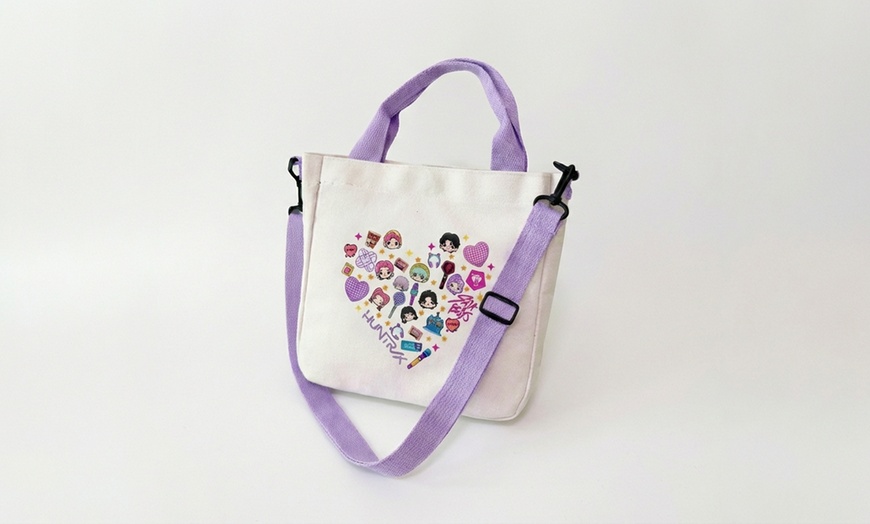 Image 8: Lightweight Purple Canvas Bag with Playful Design