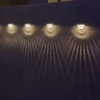 Image 5: 2, 4 or 6 pack of Solar 6 LED Water Droplet Wall Lights