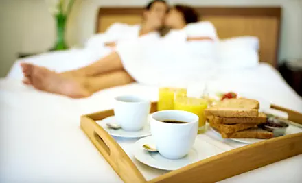 $60 for a One-Night Stay with Breakfast at Ramada Inn and Conference Center Morgantown (Up to $107 Value) - Primary Image