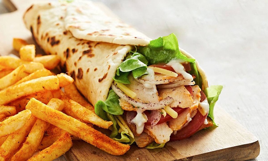 Image 1: Savor Delicious Kebabs and Drinks with Spend Voucher