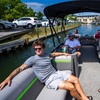 Image 1: Tritoon Boat Rentals for Water Exploration and Relaxation