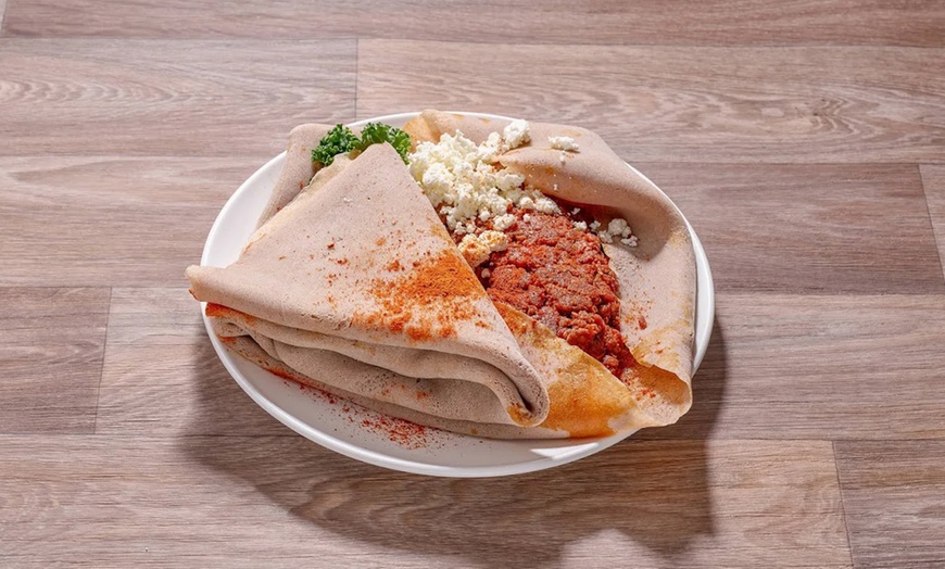 Image 2: Enjoy Dining Credit or Authentic Ethiopian Cuisine