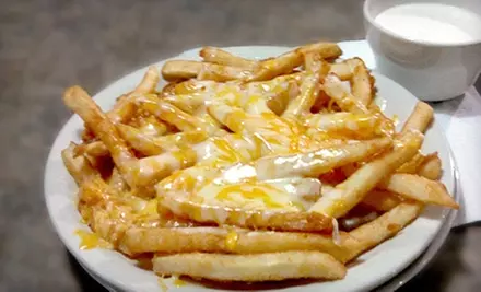 $6 for $12 Worth of American Fare and Drinks at Charlie's Restaurant in Newton - Primary Image