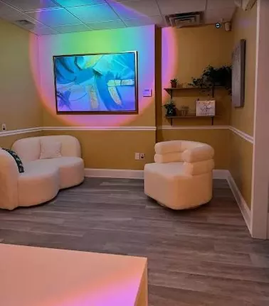 60-Minute Therapeutic Massage or Couples Massage with Hot Stones