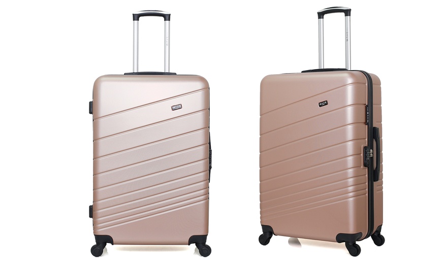 Image 13: Valise en coque rigide de la marque Wave Paris et Hero